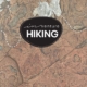 An image of a rock texture with the Hiking Logo on top